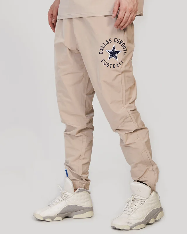 NFL DALLAS COWBOYS HYBRID MEN'S WOVEN PANT (KHAKI)